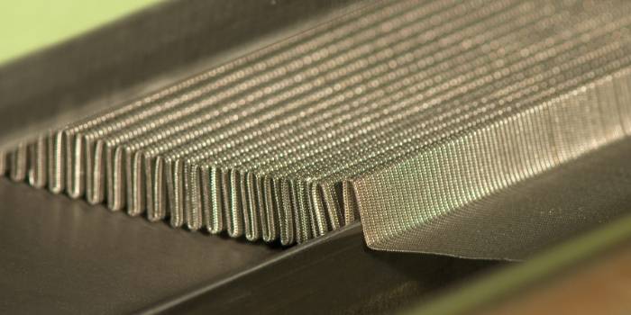 Pleated wire mesh.